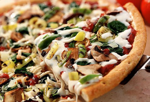 A photo of a vegetarian pizza.