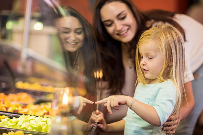 Tagging along while you run errands and do chores is boring for most children.