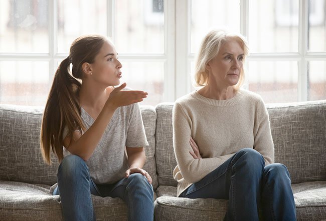 An overbearing parent is someone who wants control over their kid's life and choices. Adults can deal with overbearing parents by telling them you can't continue with family traditions or rituals, responding with gratitude, declaring off-limits topics, not answering calls and texts and establishing boundaries.