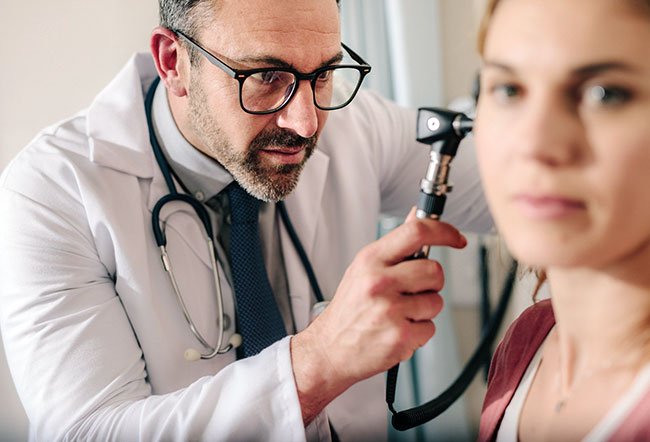 The physician performs a pneumatic otoscopy using a special tool, otoscope, in the following manner: