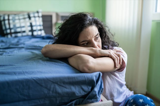 Reach out to a doctor or mental health hotline for help with depression during the COVID pandemic.
