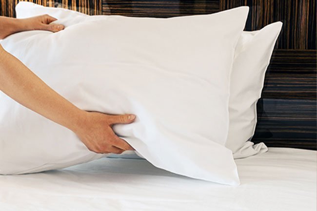 Clean your pillowcases every day in hot water if you or a family member are sick.