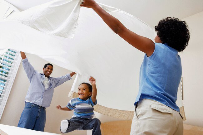 Sleep with 100% pure cotton sheets with a thread count of 200 to 400 to stay cool.