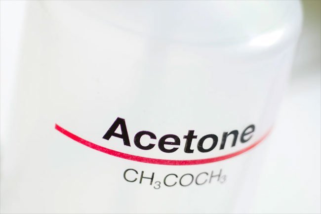 Use acetone or dry-cleaning solvent to remove grass stains on carpet.