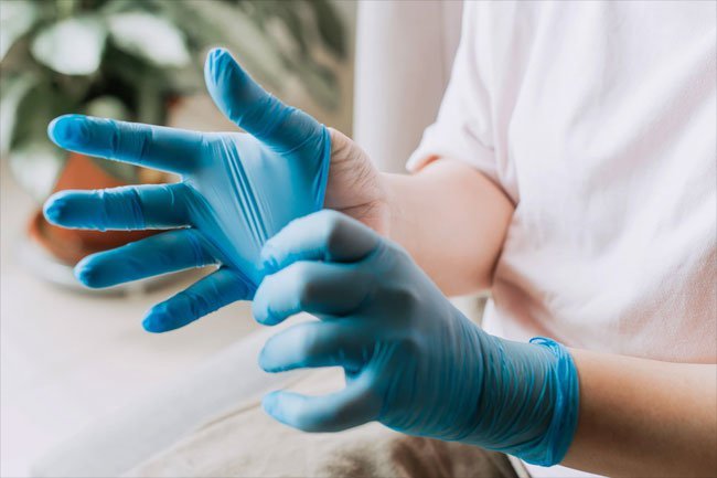 Where disposable gloves and cleaning clothes when you're tending to a messy stain.