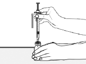 While holding the vial with 1 hand and the barrel of the syringe between the fingertips of your other hand, pull the needle straight out of the vial - Illustration