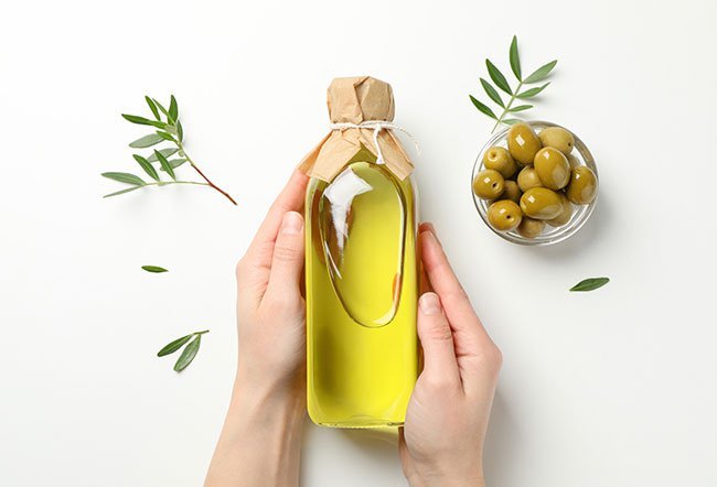 is putting olive oil in your hair good