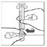 Attach to the reconstituted vial and vial adapter by turning syringe clockwise until it is securely attached - Illustration