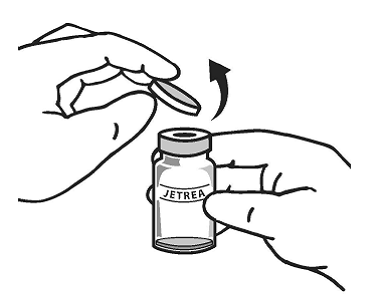 Once completely thawed, remove the protective
polypropylene blue flip-off cap from the vial - Illustration