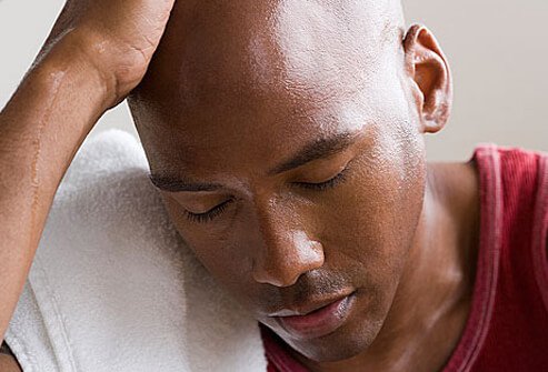 A man looking exhausted after workout.