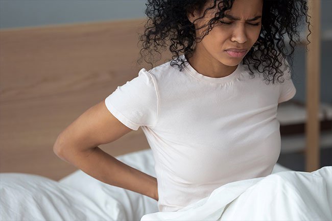 It's pretty easy to throw your back out during sexual activity. Fortunately there's different sex positions that can help!