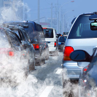 Air pollution from cars stopped in traffic.