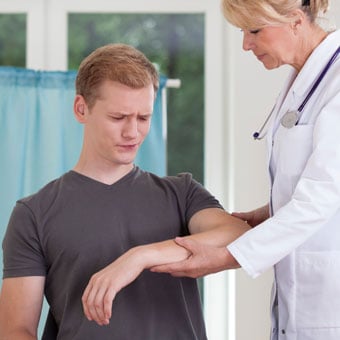 A doctor examines a patient with Lyme disease.