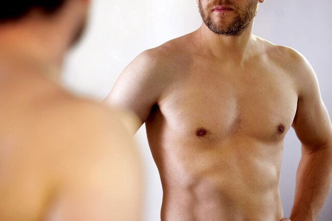 You might notice a lump or thick area in your breast tissue.