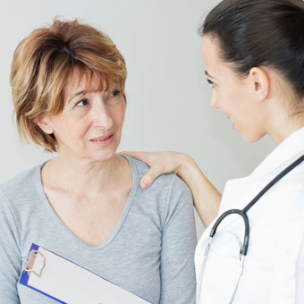 A doctor and patient discuss menopause.
