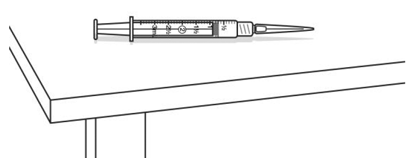 Carefully set the syringe with the needle down on the table - Illustration