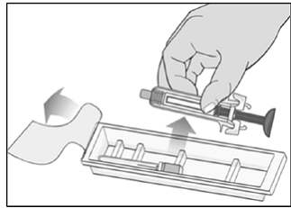 Remove the needle from the plastic tray - Illustration