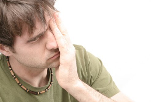A young male is exhausted and still feeling the effects of infectious mononucleosis.