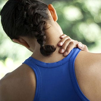 A woman with a muscle spasm (dystonia) in her neck.