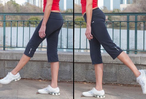 Photo of woman doing leg swings.