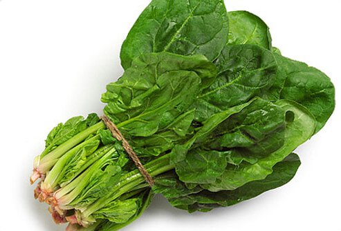 Since organic vegetables have lower pesticide residues overall, organic lettuce and spinach may be best.