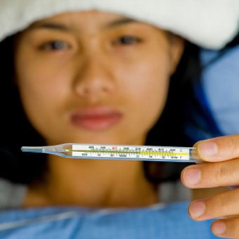 Fever can be a symptom of pneumonia.