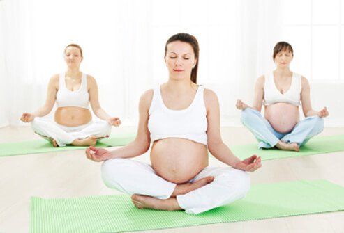 Yoga has many health benefits, but it may not be the right type of exercise while you are pregnant.
