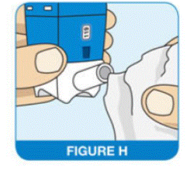 Wipe the nasal actuator tip with a clean, dry tissue or cloth - Illustration