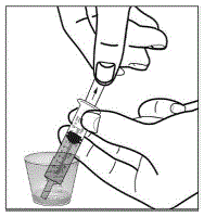 Slowly pull back on the plunger and draw up 10 mL of the mixture - Illustration