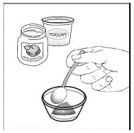 Place at least 1 tablespoon of a food such
as applesauce or yogurt in the small container - Illustration