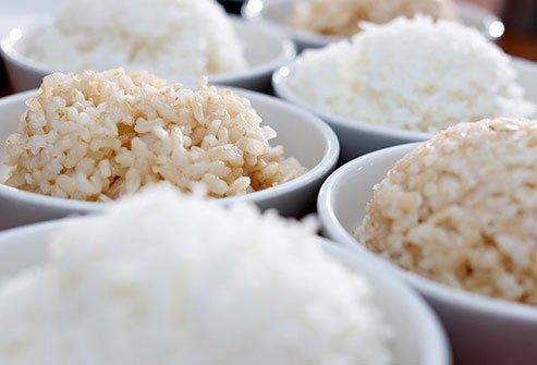 It's just like whole wheat vs. white bread. Brown rice is a whole grain. White's not.
