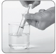 Use the 10 mL oral syringe to draw up 10
mL of water - Illustration