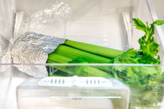 Cover celery before storing it in the crisper drawer of the fridge.