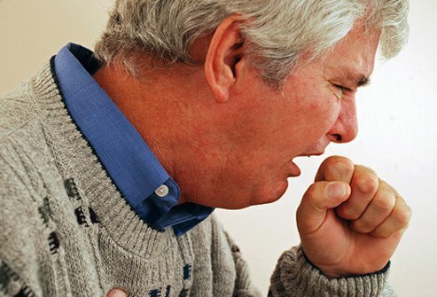 A man has respiratory problems and coughs.