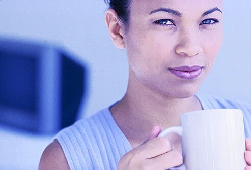Photo of woman with mug.