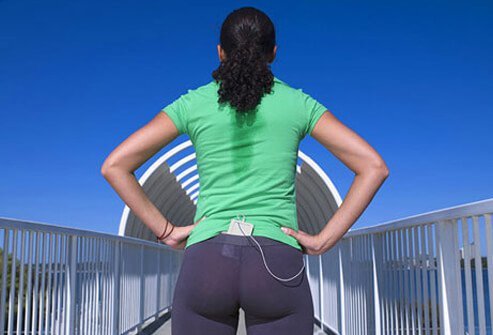 Photo of woman taking jogging break.