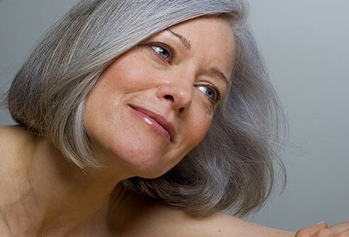 Photo of mature woman smiling.