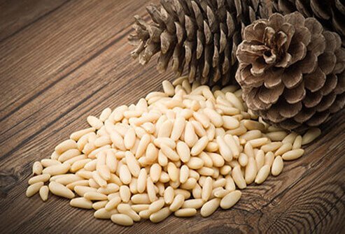 Pine nuts contain all of the amino acids along with: vitamin A, thiamin, riboflavin, niacin, vitamin E, copper, iron, manganese, and phosphorus.