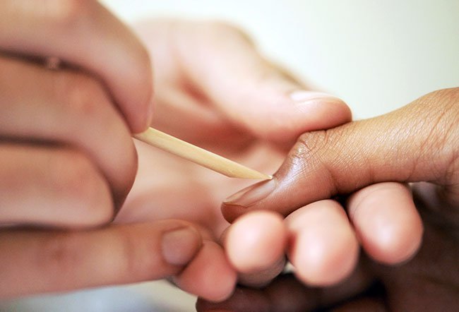 You can push your cuticles back gently with a wooden stick