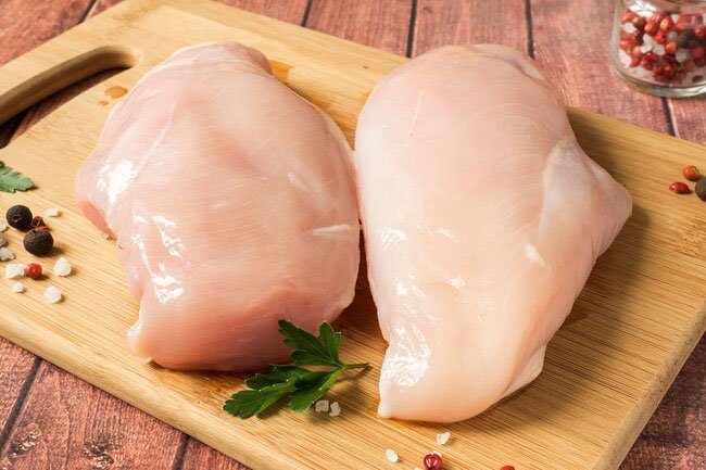 It's better to allow the cooking process to destroy bacteria on chicken rather than washing it off.