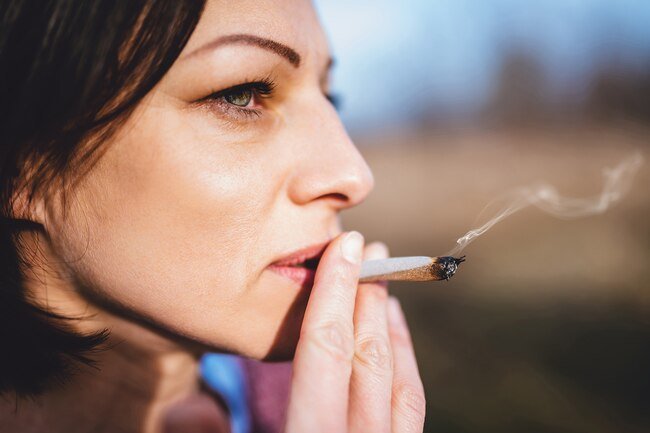 Using food, alcohol, or drugs to feel better may be a symptom of job burnout.