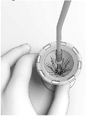 Position the tip of the Seeker with its 10° angled tip downwards toward the user in the depression in the center of the SINUVA Sinus Implant - Illustration