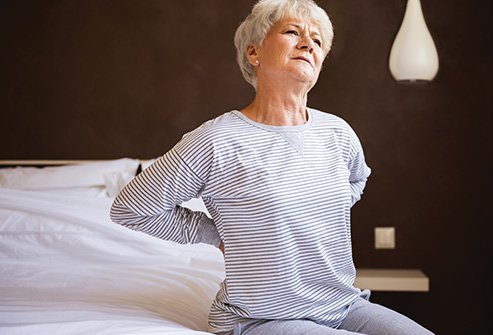 If you have back pain, sleeping on your stomach or back may aggravate your pain.