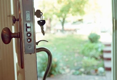 Photo of keys in door.