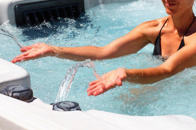 Bacteria that grow in hot tubs, showers, and pools may trigger breathing problems.