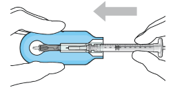 Push the syringe into the carrier - Illustration