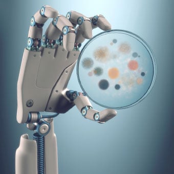 An artificial hand displays a petri dish of bacterial and fungal colonies.