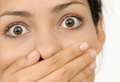 Bad breath remedies include brushing the surface of your tongue with your toothbrush or using mouthwash.
