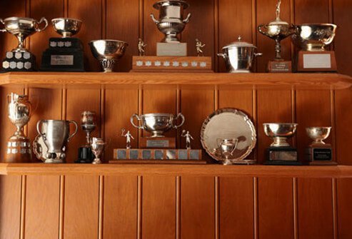 Trophies on a shelf.