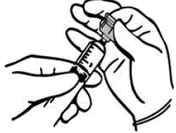 Remove the syringe from the transfer device by turning syringe counterclockwise - Illustration